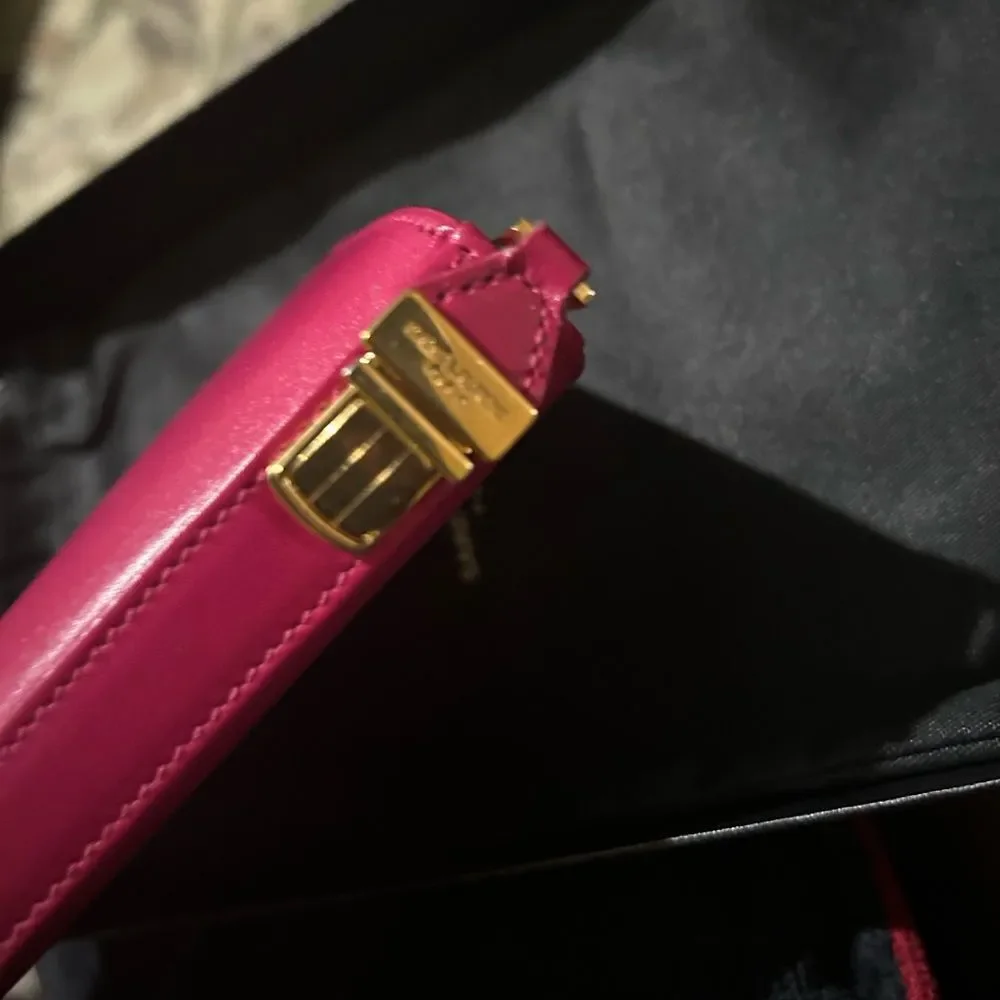 Authentic Saint Laurent Pink Zippy Wallet